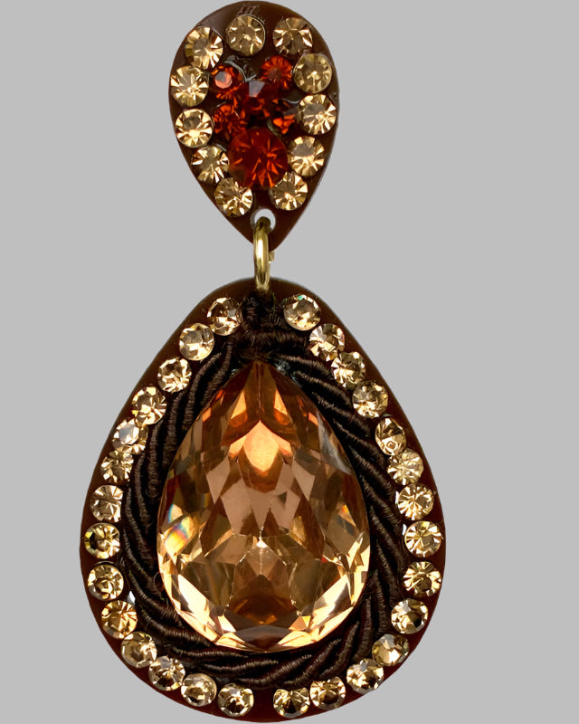 Jewelry pendant with teardrop-shaped gemstones on a white background
