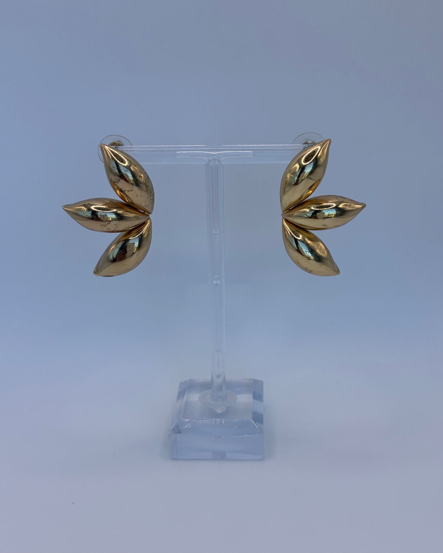 Gold leaf-shaped earrings