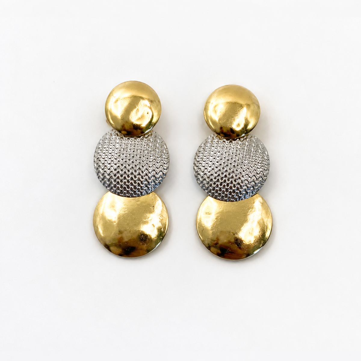 Gold and silver circular earrings