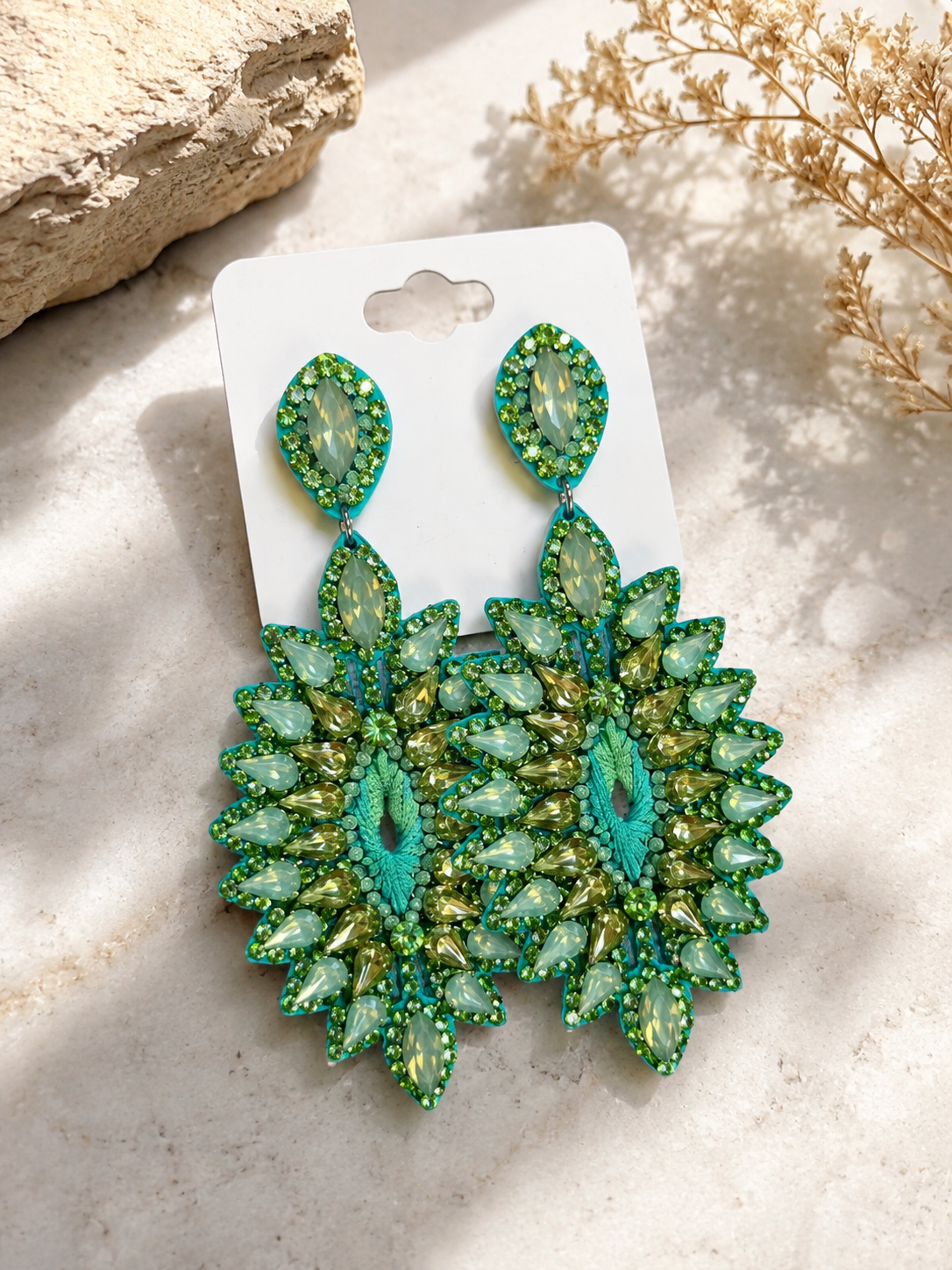Green leaf-shaped earrings