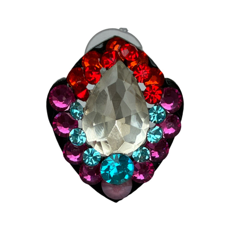 A colorful brooch with a central clear crystal surrounded by multicolored gemstones