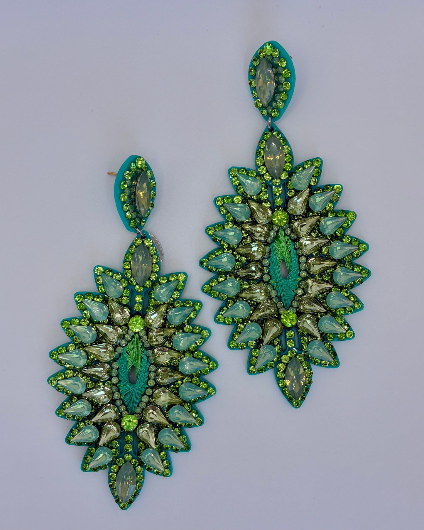 Green leaf-shaped earrings